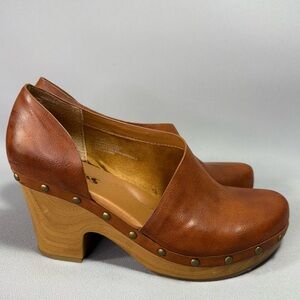 KORKS Arielle Tan Leather Cutout and Studded Wooden Heeled Clogs